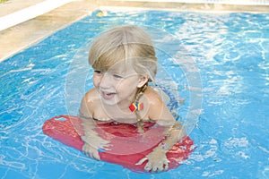 Girl in the swimming-pool