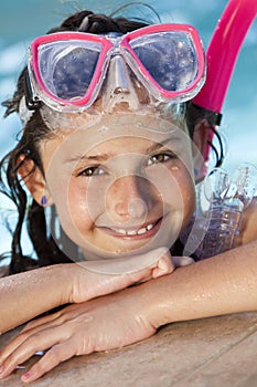 Girl In Swimming Pool with Goggles and Snorkel