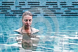 Girl on a Swimming Pool of a Resort