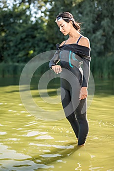 Girl in the swimrun suit outdoors