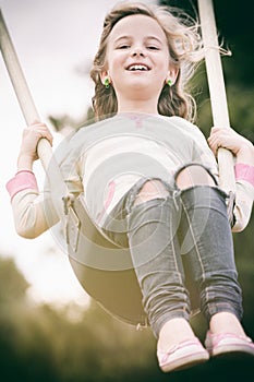 Girl on swing