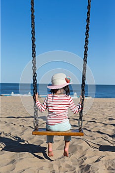 Girl on swing