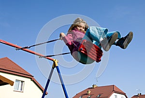 Girl on swing