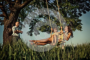 Girl on the swing photo