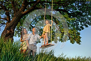 Girl on the swing photo