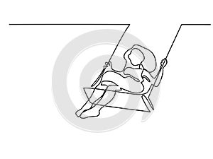 Girl swinging on swing