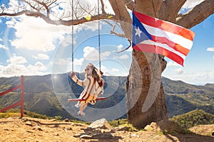 Girl Swinging Tree Puerto Rico photo