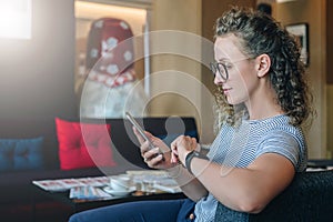 Girl in t-shirt is chatting, blogging, checking email.Student learning, studying. Online marketing, education, e