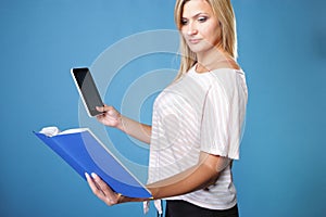 Girl with tablet computer ebook reader and book