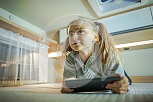 Girl with Tablet Inside RV