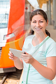 Girl with tablet waiting boarding