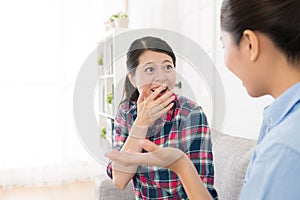 Girl taking humor joke story for her sister