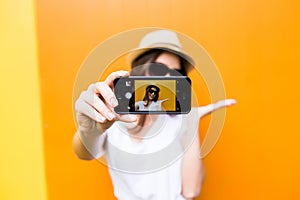 girl taking picture on smartphone self-portrait, screen view