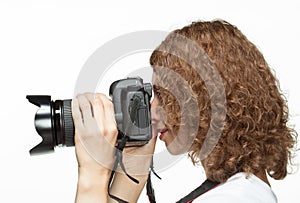 Girl taking a picture using digital camera