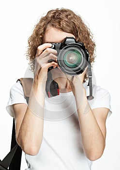 Girl taking a picture using digital camera