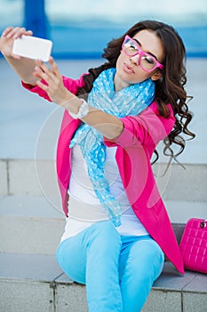 Girl taking pictures of yourself on your cell phone