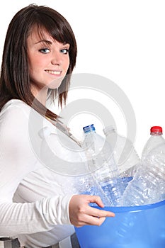 Girl taking the recycling out