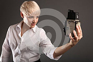 Girl Taking Selfie With Old Fashioned Camera