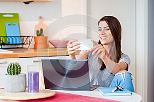 Girl taking a selfie with smartphone