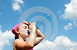 Girl taking a thirsty drink