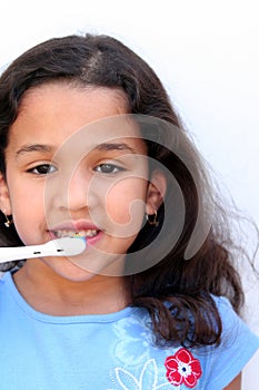 Girl Talking Brushing Teeth