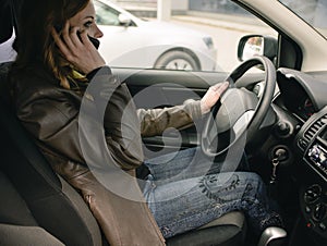 Girl talking on the phone in the car