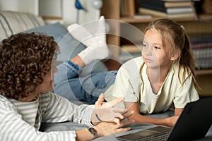 Girl talking to her mom in bedroom