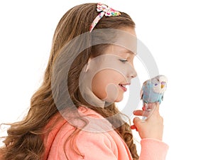 Girl with tame pet bird budgerigar