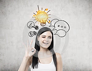 Girl in tank top and light bulb