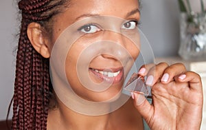 Girl tasting chocolate