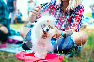 The girl with a tattoo and a dog