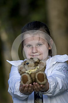 Girl and teddy bear