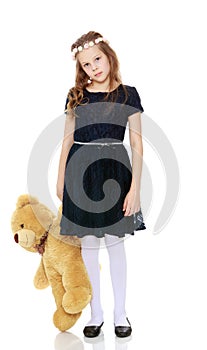 Girl with a Teddy bear.