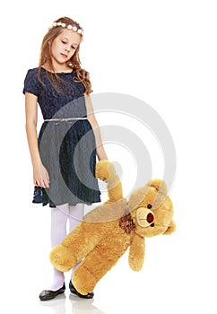 Girl with a Teddy bear.