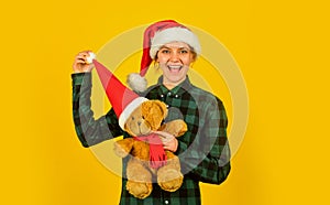 Girl with teddy bear. Charity and kindness. Lovely hug. Christmas spirit. Playful lady smiling face. Play with toy
