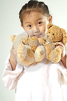 Girl with teddy bears