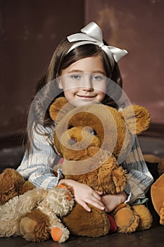 Girl with teddy bears