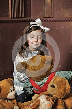 Girl with teddy bears