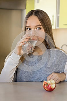 Girl teen drinks water