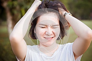 Girl teen Scratch her head Irritated and annoyed ridiculous photo