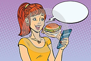 Girl teenager online ordering the Burger fast food photo