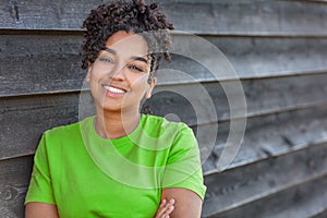 Girl teenager teen female young African American woman outside smiling with perfect teeth