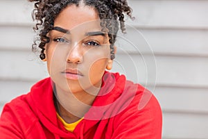 Girl teenager teen female young African American woman wearing red hoodie