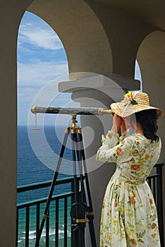 Girl with Telescope under Arches