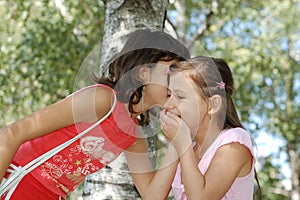 Girl Telling A Joke photo