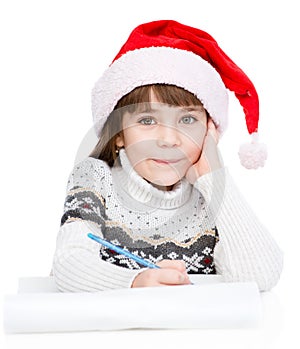 Girl thinking what to write in a letter to Santa Claus. isolated