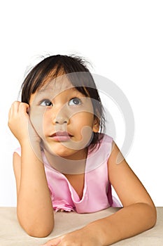 Girl thinking. White background.