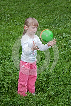 Girl throwing a ball