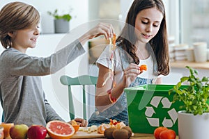 Girl throwing out fruits waste