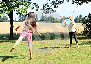 Girl throwing on a target